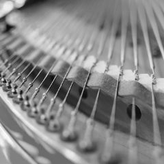 Detailed image of the strings of a classical Grand Piano in close-up Detailed image of the strings of a classical Grand Piano in close-up
